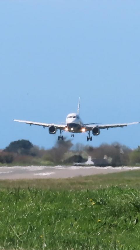 An Airbus A319 landing at Guernsey Airport
