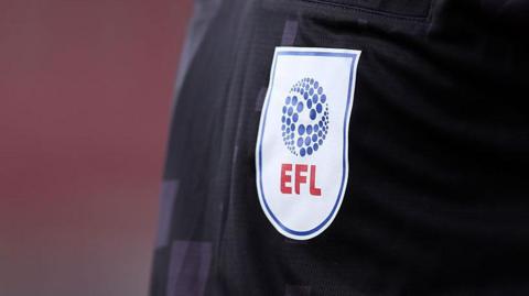 A general view of the EFL logo on the shirt of a linesman