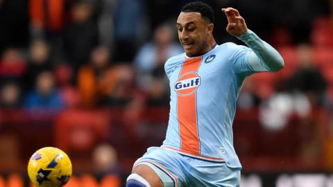 Adam Idah controls the ball 