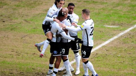 Swansea celebrate opening goal