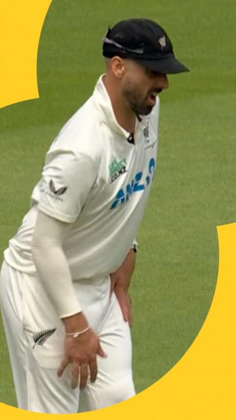 Daryl Mitchell reacts to ball hitting him in the knee at day four of England v New Zealand in the men's Test match series