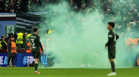 Green smoke from a pyro at Villa Park