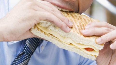 Man eating sandwich