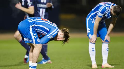 Ben Brannan crouches in disappointment