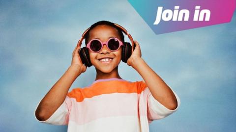 Child wearing sunglasses and wearing headphones.