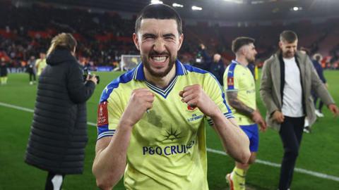 Finn Azaz celebrates after Saints beat Arsenal at St Mary's