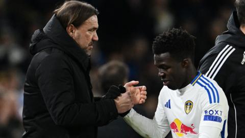 Leeds United manager Daniel Farke congratulates winger Wilfried Gnonto