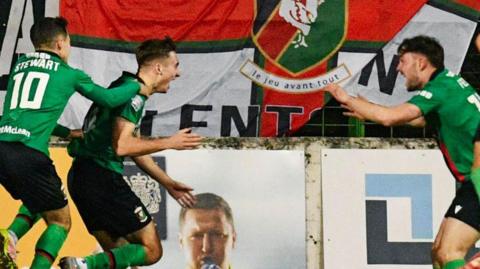 Johnny Russell celebrates scoring the late winner for Glentoran