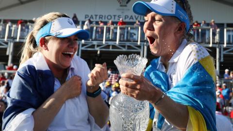 Europe's Matilda Castren and Anna Nordqvist celebrate with the Solheim Cup trophy