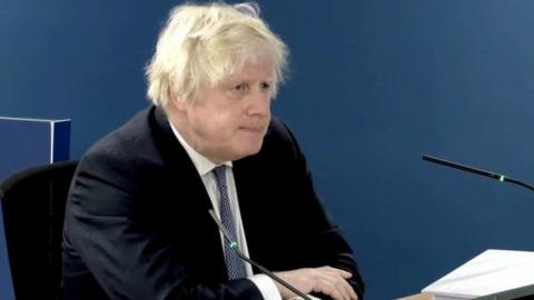 Former British Prime Minister Boris Johnson gives evidence at the Covid-19 Inquiry