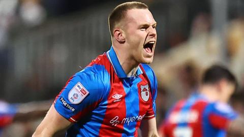Cameron McJannet, of Grimsby Town, celebrates his late winner against Cambridge United