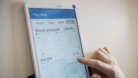 An app which monitors vital signs such as blood pressure
