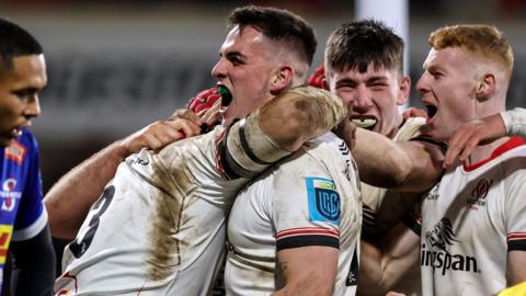 James Hume celebrates a try