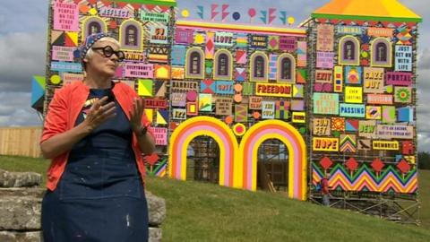 Artist Morag Myerscough in front of the replica