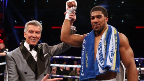 Michael Buffer congratulates Anthony Joshua at Wembley Stadium