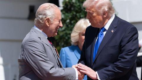 King Charles III, left, and US President Donald Trump shake hands during a departure ceremony at the South Portico of the White House in Washington.