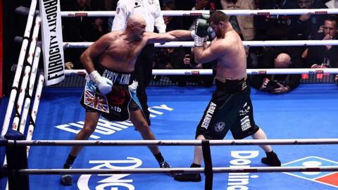 Tyson Fury lands a punch on Arslanbek Makhmudov at Tottenham Hotspur Stadium