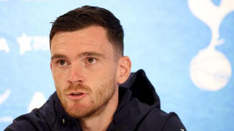 Andy Robertson speaking at a Tottenham news conference