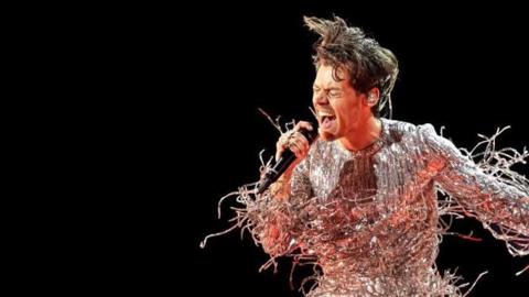Harry Styles performing