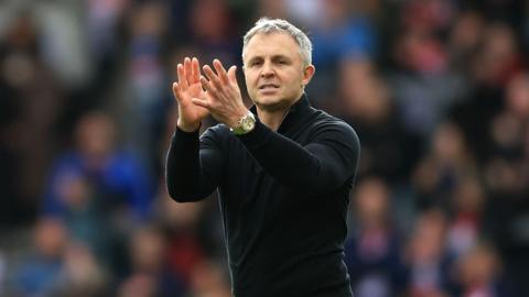 Paul Rowley claps supporters