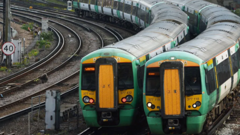 Two Southern Railway trains side by side at a junction