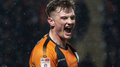 Mark Shelton celebrates a goal for Barnet