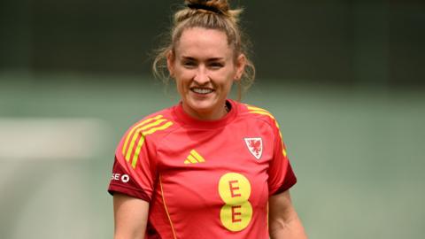 Rachel Rowe smiles as she trains with Wales in Switzerland during Euro 2025