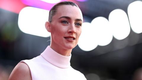 Saorise Ronan attends the "Blitz" World Premiere during the Opening Night Gala of the 68th BFI London Film Festival at The Royal Festival Hall on October 09, 2024 in London, England