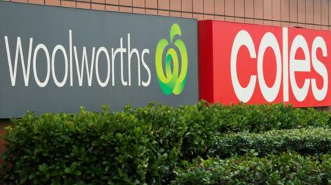 Woolworths and Coles signs