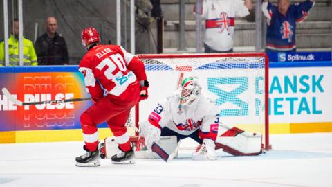 Action shot between Great Britain and Denmark in their ice hockey Winter Olympics qualifier 