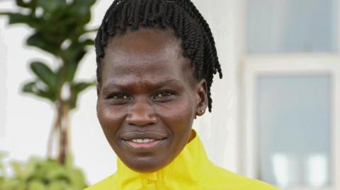 Ugandan Olympic athlete Rebecca Cheptegei poses for a portrait during Team Uganda flag off to the Paris 2024 Olympics at the State House in Entebbe, Uganda, 16 July 2024