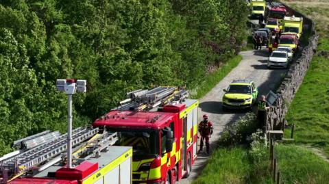 Emergency services on a rural lane in West Yorkshire
