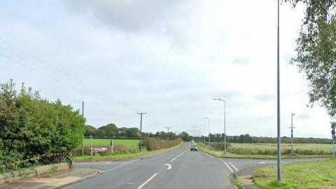 A general view showing the junction on Chester Road, between Stoney Lane and the A54. A car can be seen in the distance. 