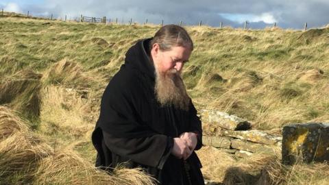 Brother Nicodemus Mary praying