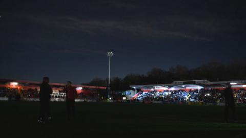 The Lamex Stadium is plunged into darkness