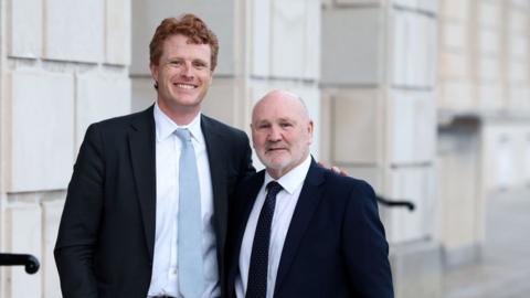 US Special Envoy Joe Kennedy poses outside Stormont with NI Assembly Speaker Alex Maskey