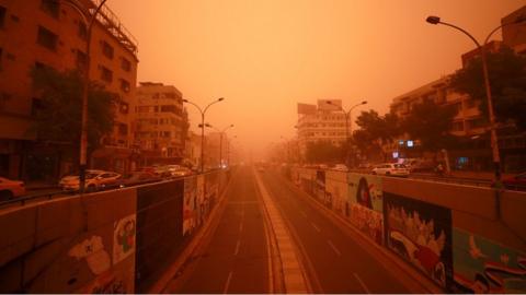 Iraq street with an orange tint