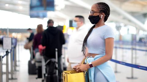 Woman at Heathrow Airport