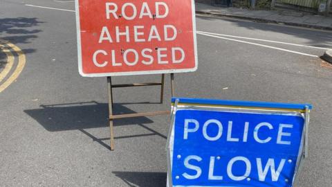 Two police signs in Luton