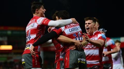 Gloucester celebrate Santiago Carreras' try