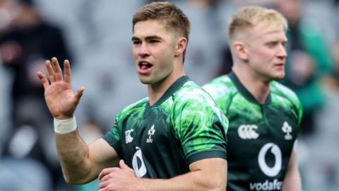 Jack Crowley warming up