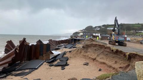 road washed away by sea