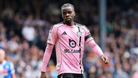 Leicester City player Stephy Mavididi , in pink shirt, walks during the game at Blackburn.