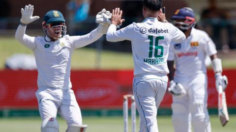 South Africa wicketkeeper Kyle Verreynne and bowler Keshav Maharaj celebrate the wicket of Sri Lanka's Kusal Mendis