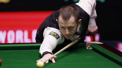 Mark Allen strikes the white at the snooker table