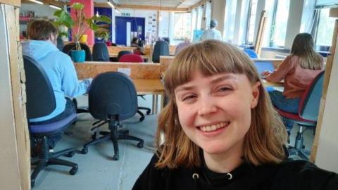 Jenna Thorensson at her desk