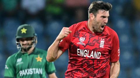 England bowler Jamie Overton celebrates taking a wicket