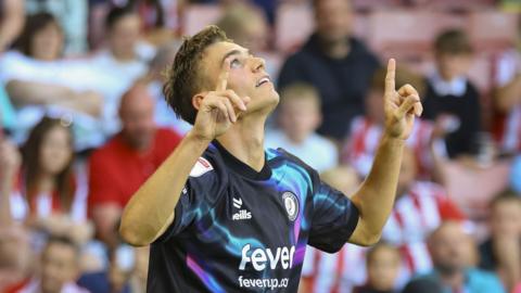 Scott Twine celebrates