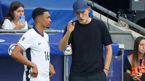 England head coach Thomas Tuchel speaks to Trent Alexander-Arnold on the touchline