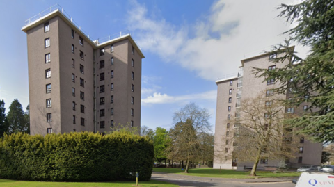 a google street view of two blocks of high rise flats in Dryburgh Gardens in Dundee